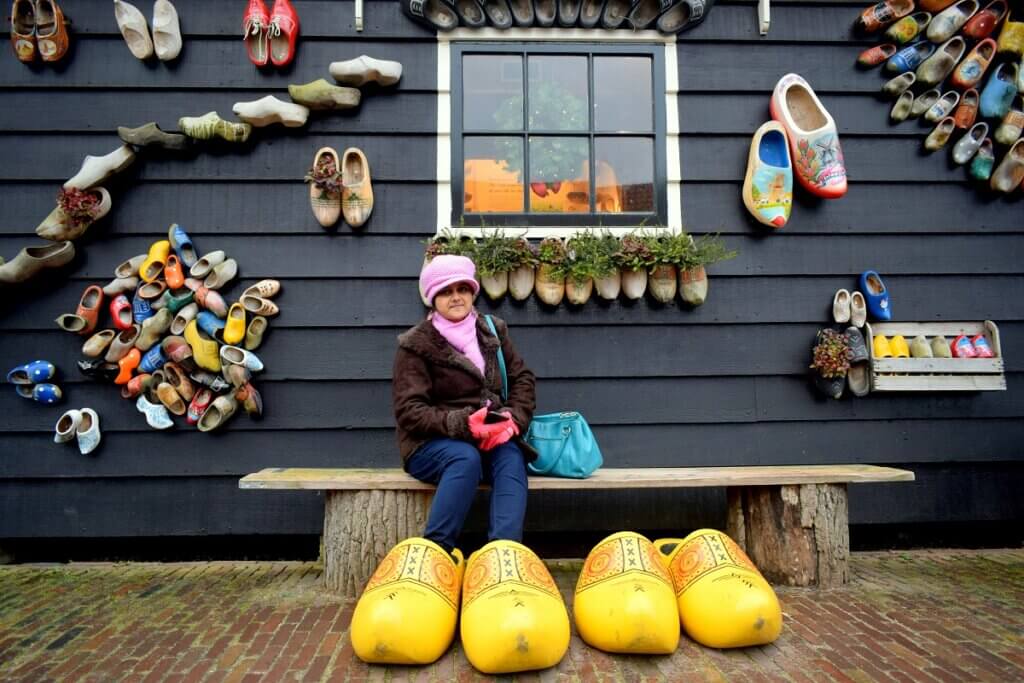 Annapura Posing at the Entrance of Wooden Shoe Factory